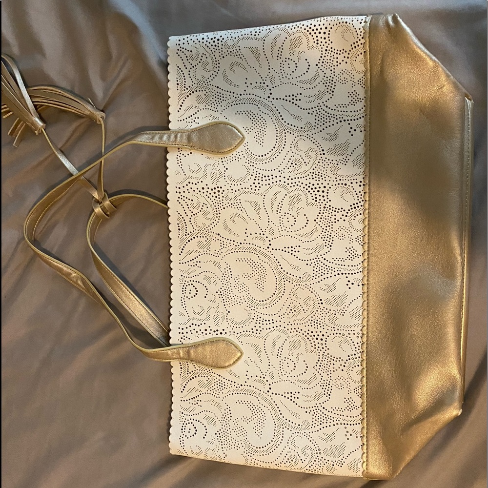 Super cute gold and white bag